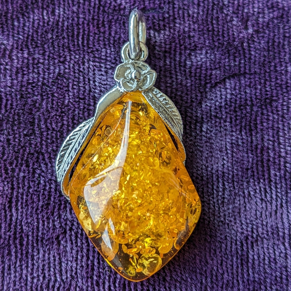Exotic Asymmetric Pendant With Rich Fancy Yellow Amber